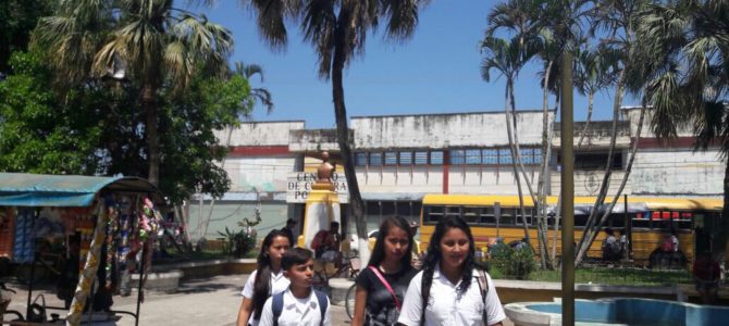 Roof repair on school before and after in Honduras